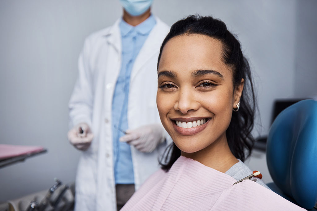 a patient on a dental clinic, smiling after a teeth whitening treatment